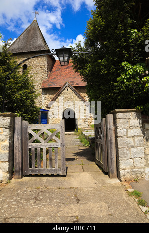 The Entrance to St Dunstan s church in the pretty Kent village of West Peckham UK Stock Photo