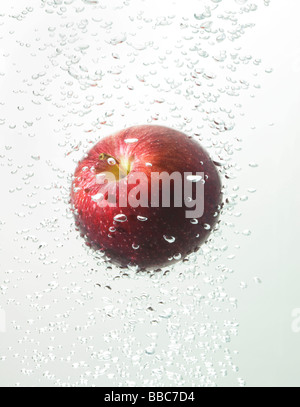 Apple in water bubbles Stock Photo