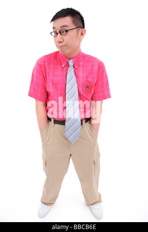 Man with hands in pocket, making face Stock Photo