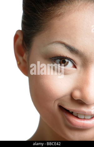Young woman looking at camera, head shot Stock Photo