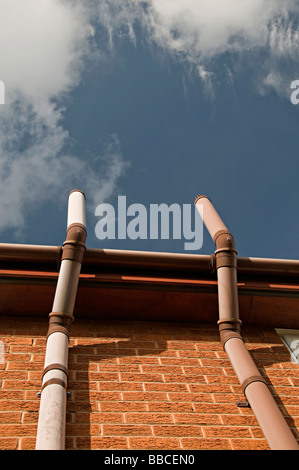 a ventilation pipe  on a modern house that lets gases from the sewer system from  dirty water to escape Stock Photo