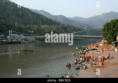 People bathing in the Ganges river. Ram Jhula. Rishikesh. Uttarakhand. India Stock Photo