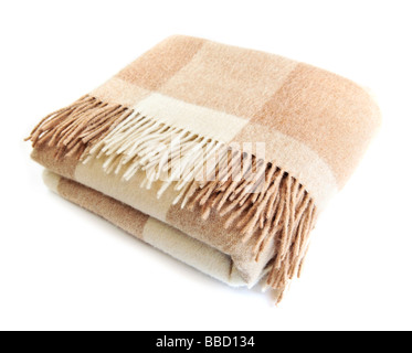 Soft and warm folded alpaca wool blanket with fringe Stock Photo