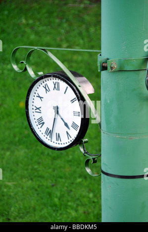 Outdoor Antique Pole Clock Stock Photo