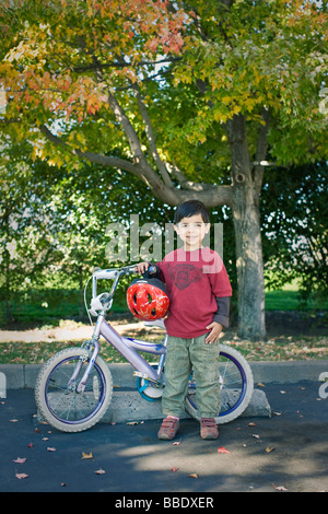 Boy with Bicycle, Ashland, Oregon, USA Stock Photo