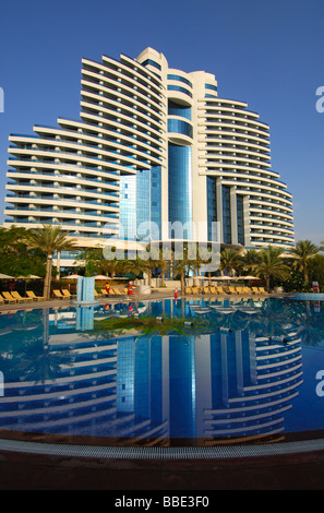 Le Meridien Hotel Al Aqah Beach Resort Hotel mirrored in the swimming pool, Fujairah, United Arab Emirates, UAE Stock Photo