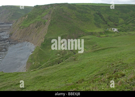 Marsland Mouth and sea cliffs at Marsland Mouth on the Devon Cornwall border Stock Photo