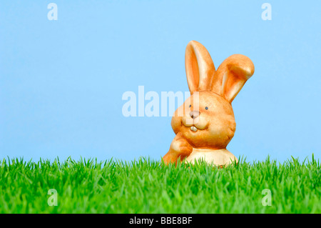 Ceramic Easter bunny, garden decoration, symbolic picture for Easter Stock Photo