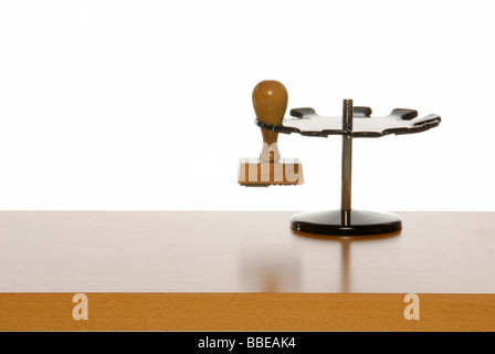 Stamp on a desk, symbolic image for bureaucracy Stock Photo
