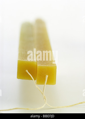 Two Square Candles Stock Photo