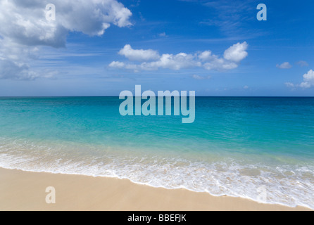 WEST INDIES Caribbean Grenadines Grenada St George Waves breaking on shore at Grand Anse Beach with the turquoise sea beyond. Stock Photo