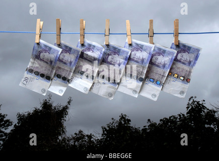 £20 notes on a washing line Stock Photo