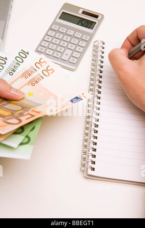 Woman's Hands Counting Money Stock Photo