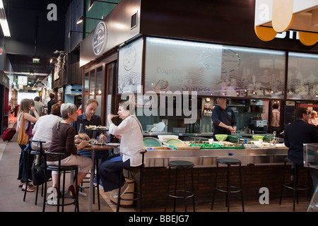 Sea Food restaurant in Les Halles de Lyon Paul Bocuse Gourmet market Lyon Rhone Alps France Stock Photo