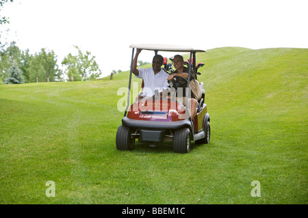 Men in Golf Cart, Burlington, Ontario, Canada Stock Photo