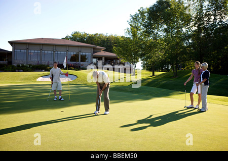 Couples Golfing, Burlington, Ontario, Canada Stock Photo