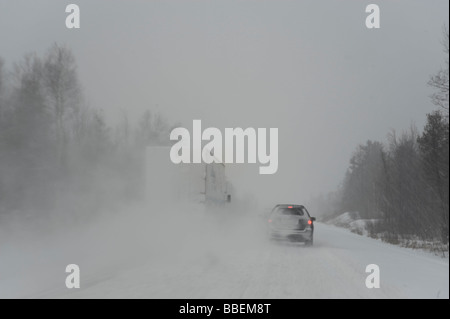 Car and Truck on Highway, Ontario, Canada Stock Photo