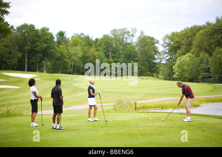 People Golfing Stock Photo