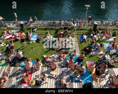 Open air bath Letten at river Limmat people sunbathing Zurich Switzerland Stock Photo