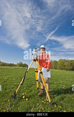 Surveying with theodolite Stock Photo