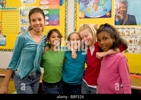 differing 3rd grade girls group 8-9 year old olds ethnic inter racial diversity racially diverse multicultural cultural interracial POV United States Stock Photo