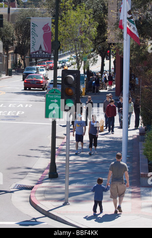 Street scene with people walking on sidewalk on main street in downtown Los Gatos California Stock Photo