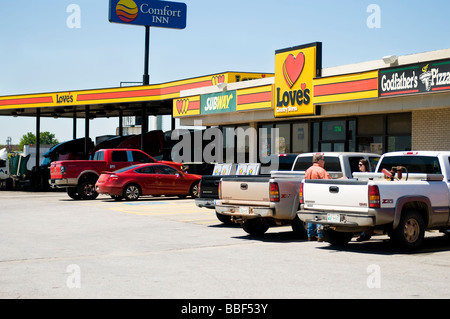 Love's Country Store, a chain convenience store and gasoline station next to Godfather’s Pizza in Oklahoma City, Oklahoma, USA. Stock Photo