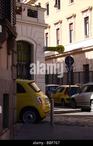 Fiat 500 parked in a back street in central Rome, Italy Stock Photo - Alamy