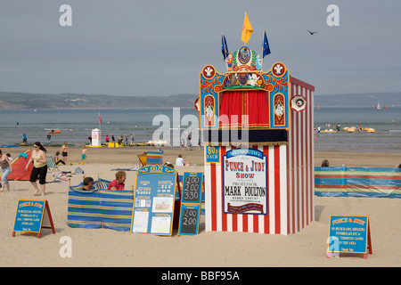 weymouth beach punch and judy show dorset summer beach holiday england uk gb Stock Photo