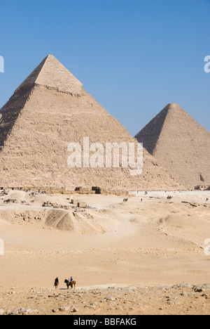 Pyramid Agra Two tourists are dwarfed by the massive scale of the upper tiled area ...