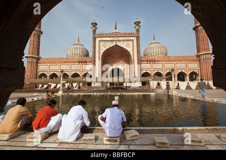 Muslim Men Washing Feet at the Jama Masjid in Old Delhi India Stock Photo