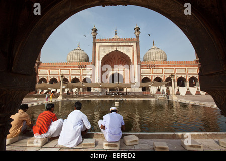 Muslim Men Washing Feet at the Jama Masjid in Old Delhi India Stock Photo