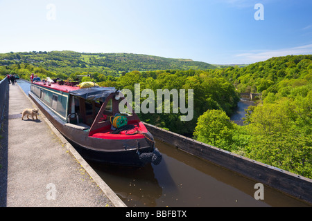 Canal boat crossing River Dee near Llangollen on Shropshire Union canal at Pontcysyllte aqueduct Wales UK United Kingdom Stock Photo