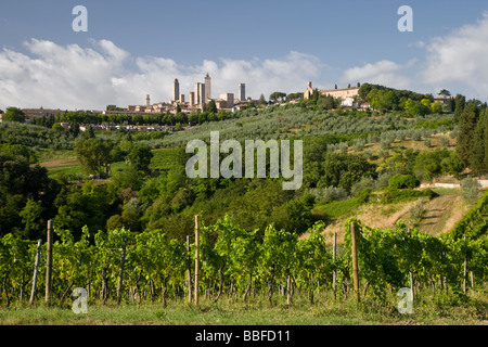 View over farmland to the towers of San Gimignano seen from the north, Tuscany, Italy Stock Photo