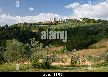 View over farmland to the towers of San Gimignano seen from the north, Tuscany, Italy Stock Photo