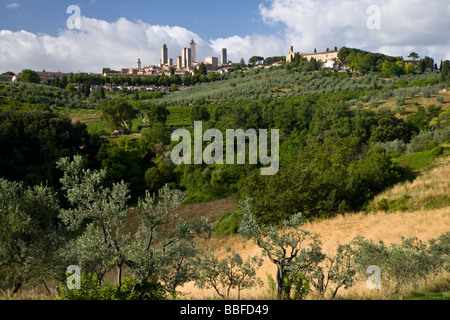 View over farmland to the towers of San Gimignano seen from the north, Tuscany, Italy Stock Photo