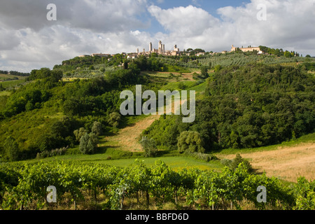 View over farmland to the towers of San Gimignano seen from the north, Tuscany, Italy Stock Photo