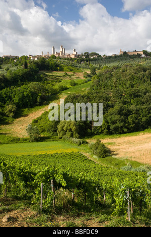 View over farmland to the towers of San Gimignano seen from the north, Tuscany, Italy Stock Photo