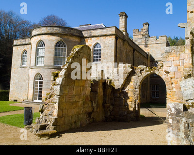 A sunny spring morning at Brinkburn Priory and Hall, near Rothbury in Northumberland England UK Stock Photo