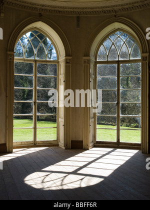 Looking through the windows of the hall at Brinkburn Priory, near Rothbury in Northumberland England UK Stock Photo