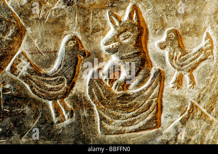 Carlisle Castle prisoner's stone carving carvi on prison cell wall fox preaching from pulpit English Medieval art imagery Cumbri Stock Photo