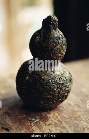 Tea leaves pressed in form of vase Stock Photo