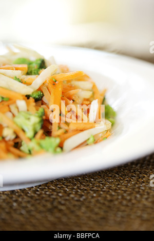 Bowl Of Fresh Healthy Colourful Vegetarian Steamed Sliced Vegetables Isolated Against A White Background With No People And A Clipping Path Stock Photo