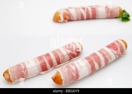 Bernese sausage wrapped in bacon Stock Photo