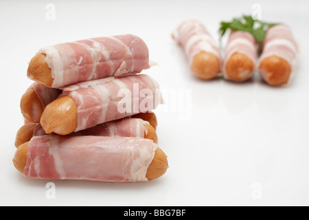 Bernese sausage wrapped in bacon Stock Photo