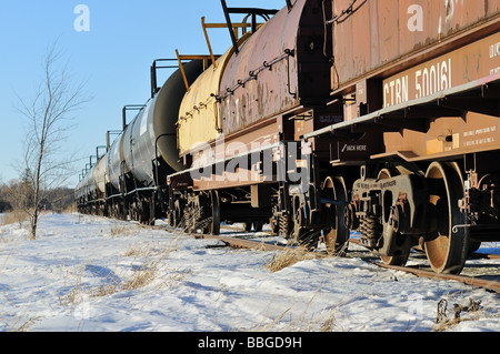 Train on tracks during winter. Stock Photo