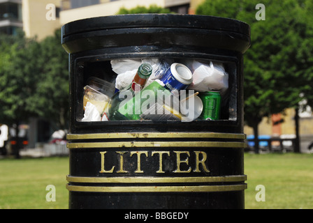 Full litter bin in a London park Stock Photo