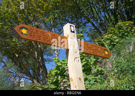 'The Cleveland Way' coastal footpath sign at Boggle Hole near Robin Hood's Bay in North Yorkshire, England, UK. Stock Photo