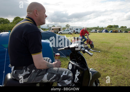 Skinheads on scooters in festival campsite at the Northern Soul Modernist Weekender, Newton upon Derwent, York, North Yorkshire Stock Photo