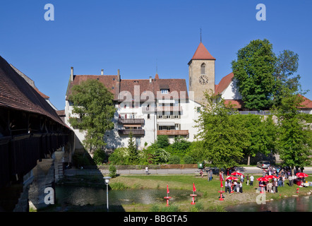 Covered wooden bridge across the Alte Aare River, Aarberg ...